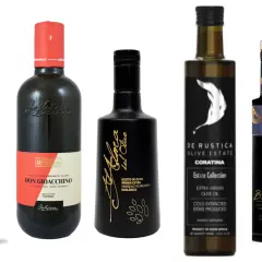 Varias botellas de aceite de oliva virgen extra, incluyendo aceitunas para aceite de Coratina, con etiquetas elegantes y distintivas.