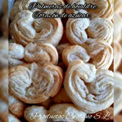 Palmeras de hojaldre, crujientes y doradas, con un corazón de azúcar. Un dulce perfecto para cualquier momento.