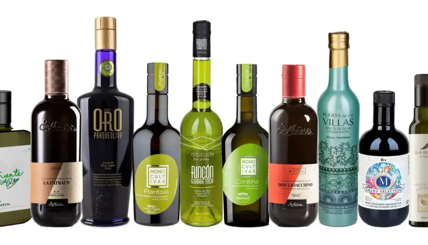 Varias botellas de aceite de oliva virgen extra, mostrando el **aceite de oliva origen** de diferentes regiones y variedades.